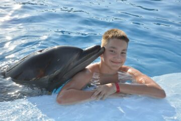 Dolphin Show Tour from Hurghada Swim with Dolphins in Pool - Photo Session 5