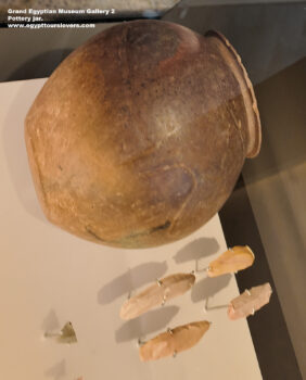 116-Naqada-ii-period,-Hierakonpolis,-Ancient-Egypt,-History-Pharaohs,-Grand-Egyptian-Museum,-Pottery-jar,-An-image-of-a-lion-was-carved-into-the-clay-before-this-fine