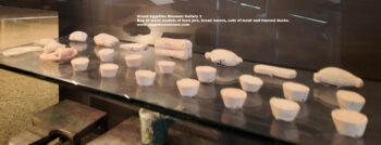 217_2-dynasty-4-6,-Ancient-Egypt,-History-Pharaohs,-Grand-Egyptian-Museum,-limestone,-giza,-Box-of-stone-models-of-food-jars,-bread-loaves,-cuts-of-meat,-trussed-ducks