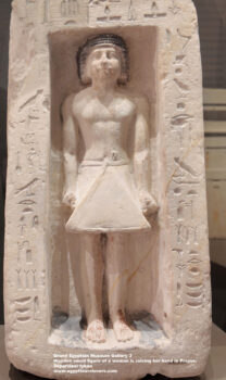 235_1-dynasty-5-6,-limestone,-wood,-Saqqara,-luxor,-Wooden-small-figure-of-a-woman-is-raising-her-hand-in-Prayer,-Supervisor-Iykau,-Ancient-Egypt,-History-Pharaohs,-Grand-Egyptian-Museum