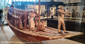 266_2-Dynasty-11,-plaster,-wood,-Assiut,-model-of-a-Mesehti-boat-to-commemorate-the-pilgrimage,-Abydos,-Religious-Journeys-Ancient-Egypt,-History-Pharaohs,-Grand-Egyptian-Museum