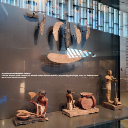 31_1-Dynasty-6,-wood,-Saqqara,-meir,-food-preparation,-Ancient-Egypt,-History-Pharaohs,-Grand-Egyptian-Museum,-servant-statue-figures,-a-woman-heating-bread-trays-for-baking-bread