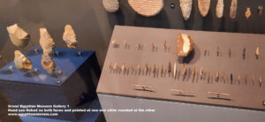 7-late-Paleolithic,-Flint-stone,-great-sand-sea,-Hand-axe-flaked,-hunting,-cutting,-digging-roots-and-skinning-prey,-human-history,-Ancient-Egypt,-History-Pharaohs,-Grand-Egyptian-Museum-Gallery