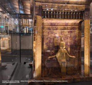 Canopic-Shrine-on-a-Sledge---Gilded-Shrines-King-Tutankhamun-Grand-Egyptian-Museum,-ancient-Egyptian-religion,-Egypt-gods,-Isis,-Nephthys,-Selket,-Neith-