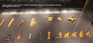 Golden-amulets-around-the-neck-of-King-Tutankhamun-Treasures-in-Grand-Egyptian-Museum
